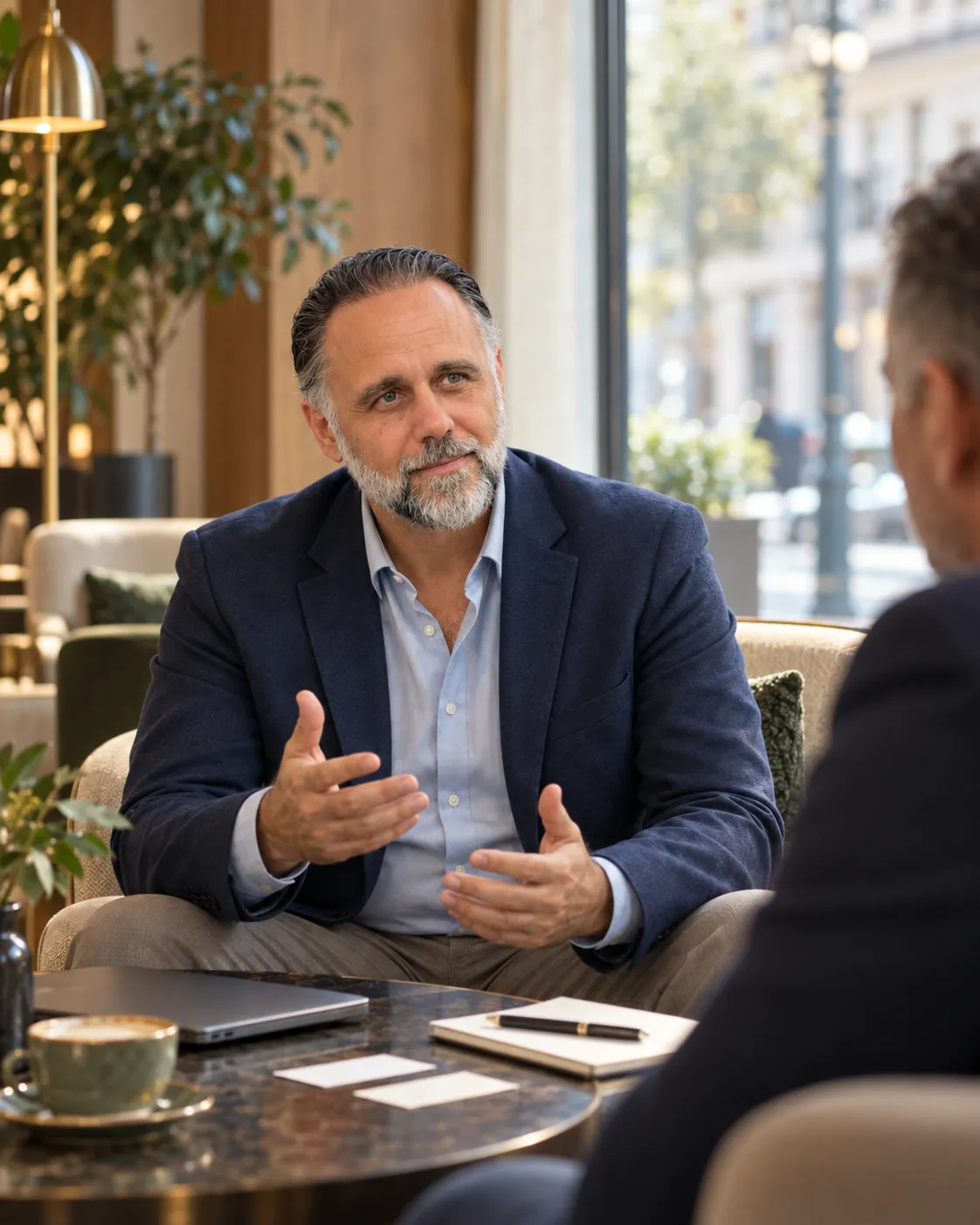 Hasan Hasic in conversation with a business owner about digital priorities in an SME.